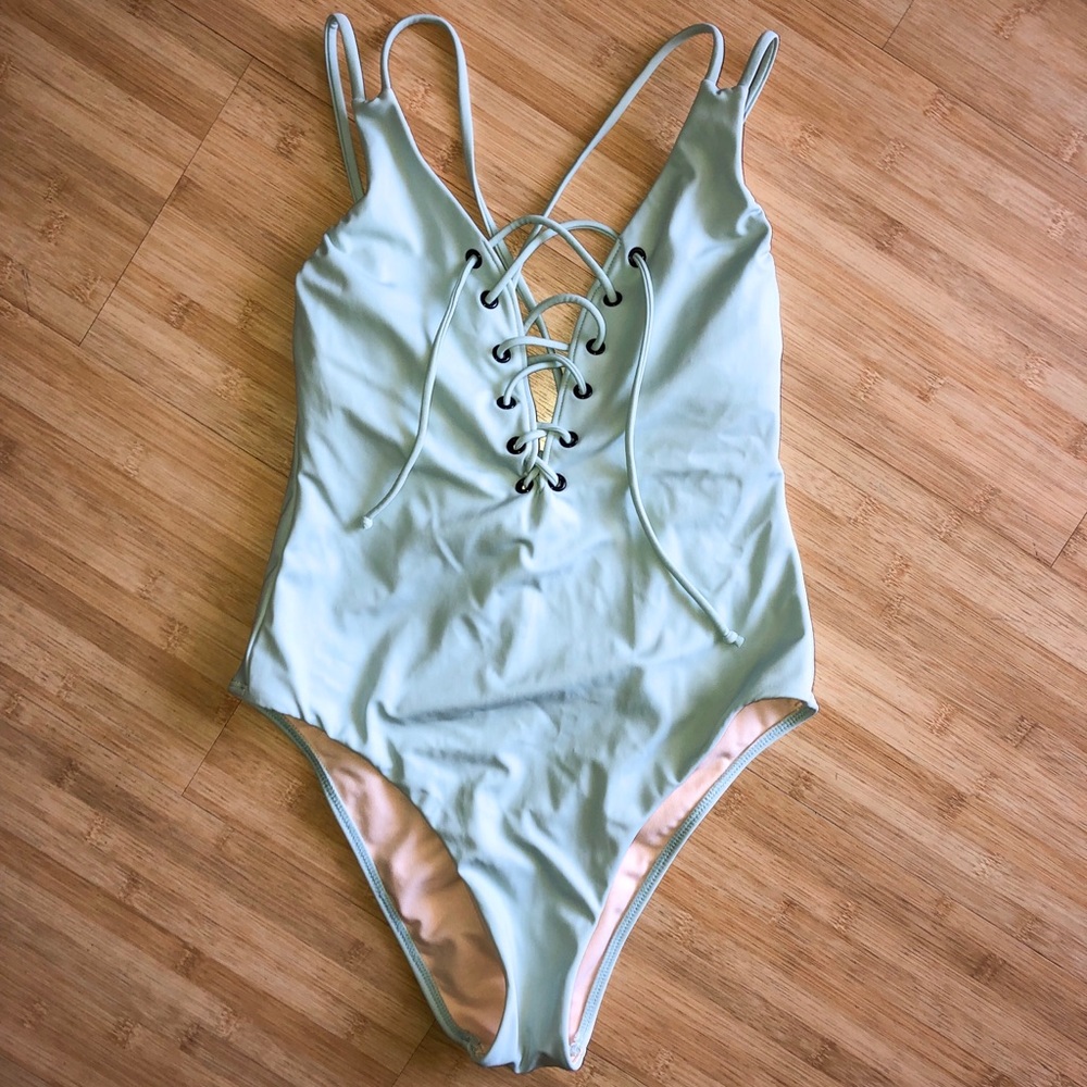 Strappy one piece suit